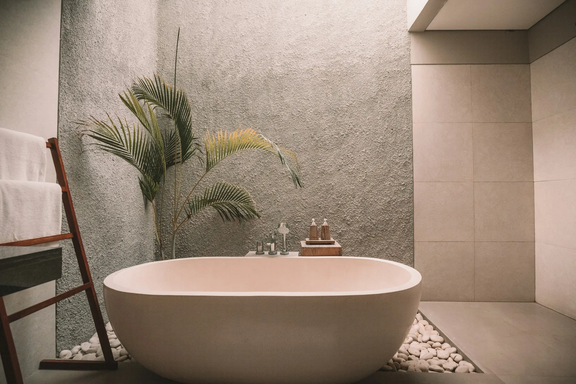 Remodeled bathroom with a glass walk-in shower and a double vanity