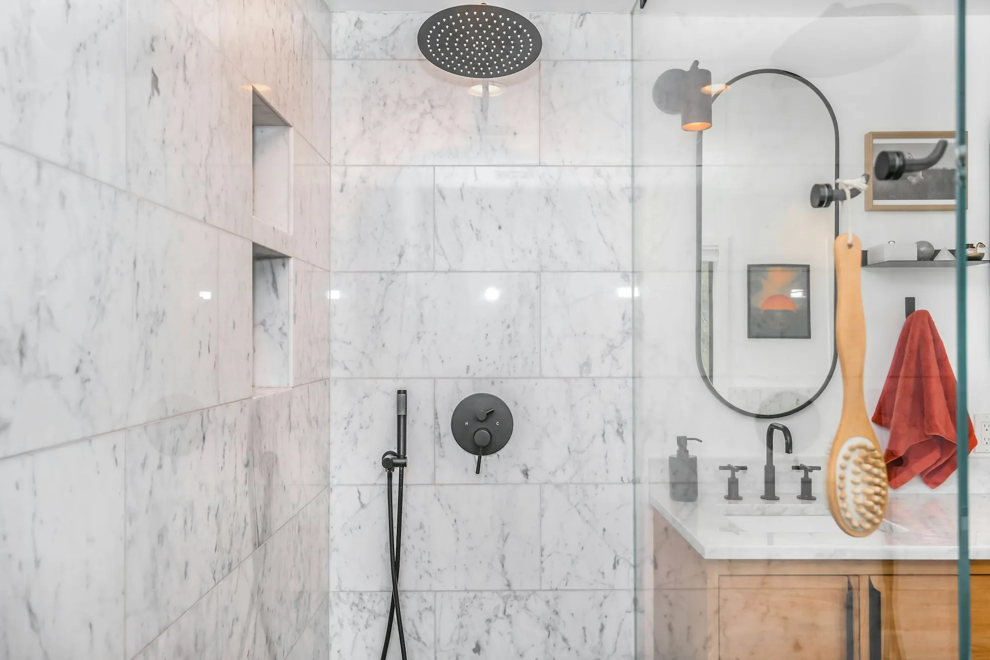 Remodeled hall bathroom with subway tile and a new tub-shower combination